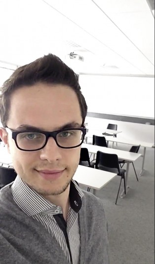 Erenik Yzeiraj standing outdoors